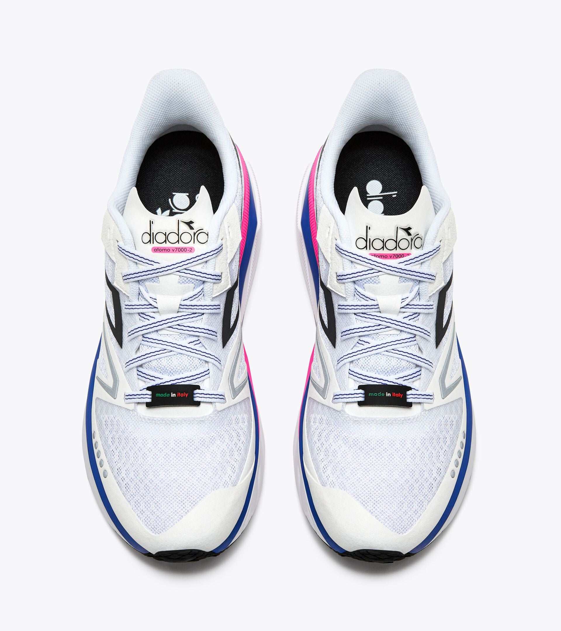 ATOMO V7000-2 running shoes, Made in Italy, lightweight, Diadora tradition, Anima technology, 5mm drop, white and pink design.