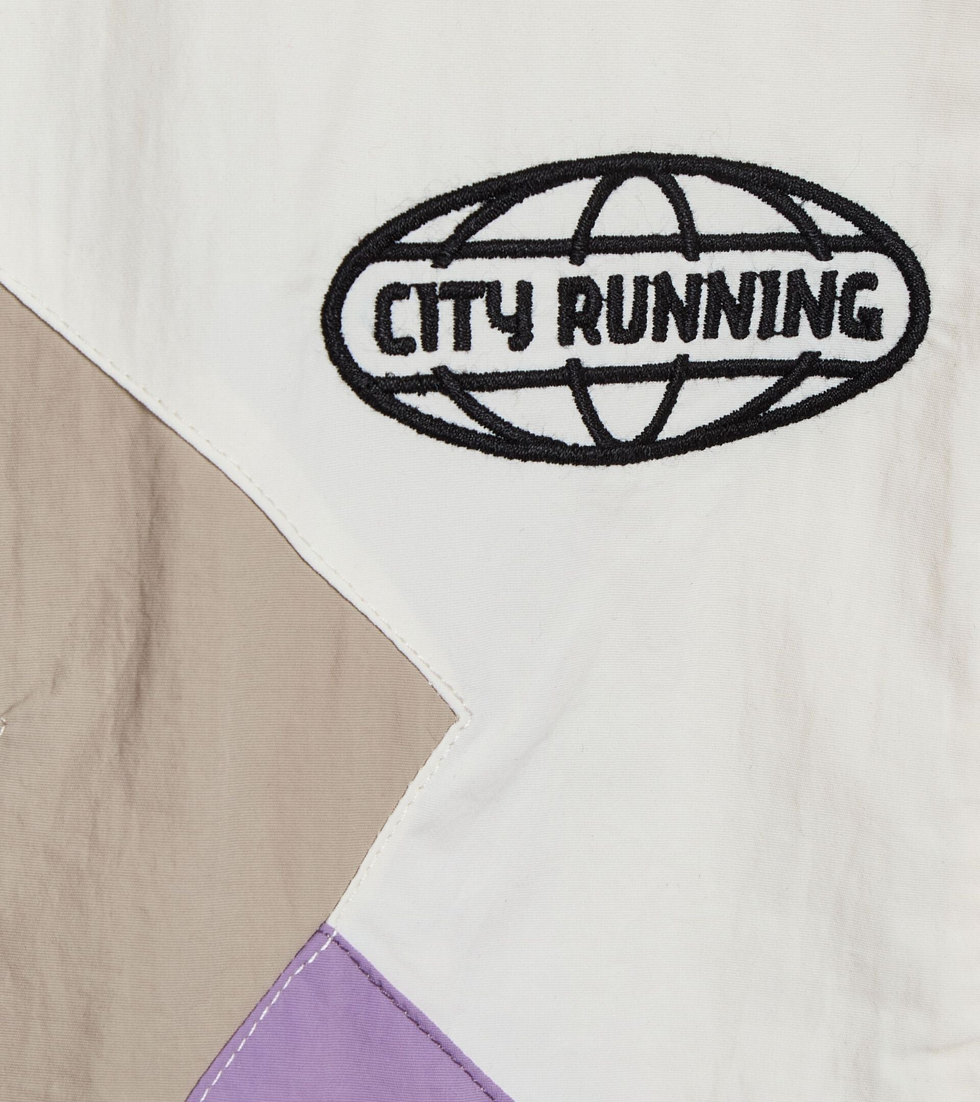 TRACK JACKET MILL CITY with City Running logo, made in Italy, gender-neutral, urban flair.