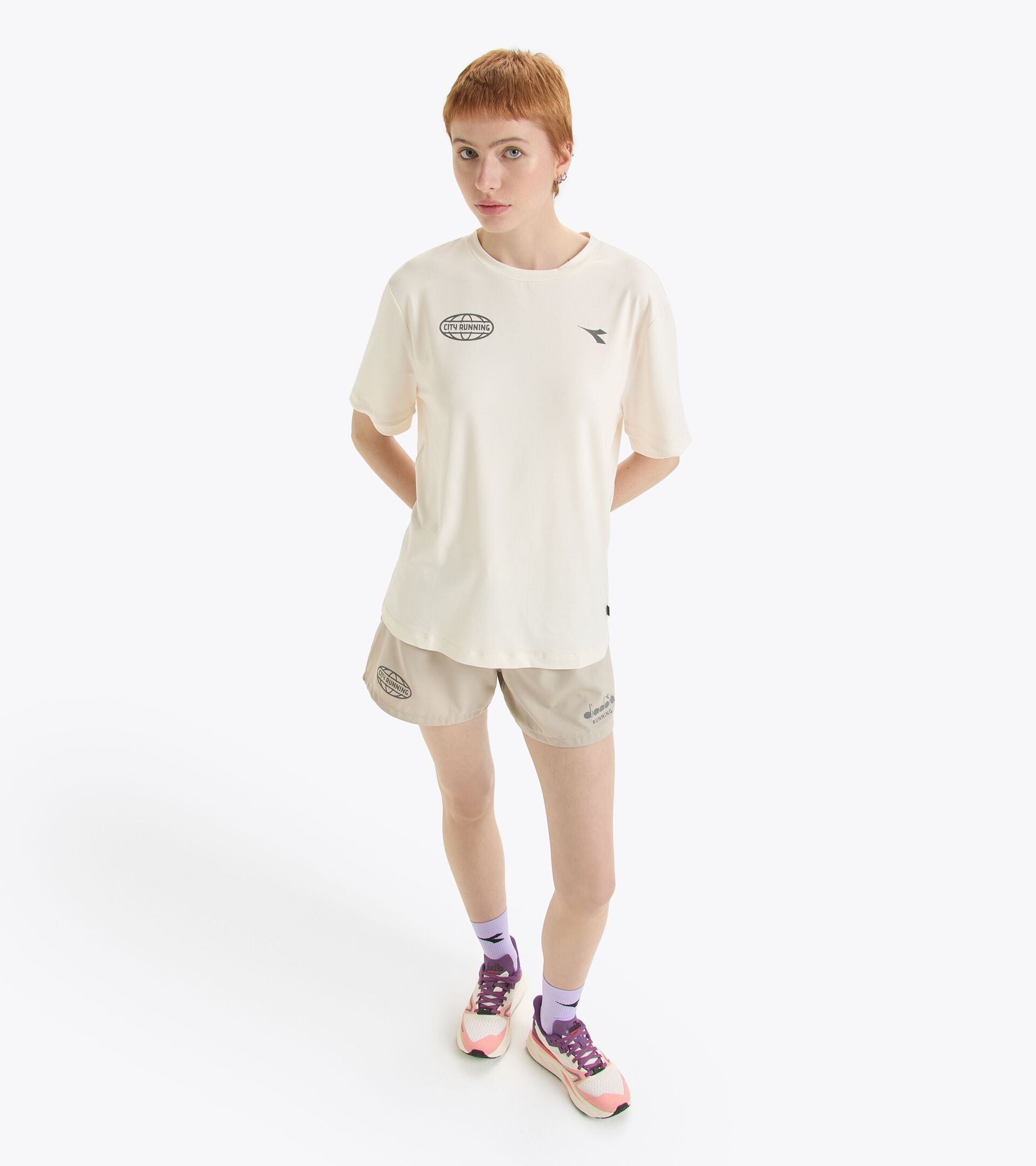 Unisex short sleeve training T-shirt in white, made from soft, stretchy polyester with recycled materials, designed for optimal performance and moisture-wicking.