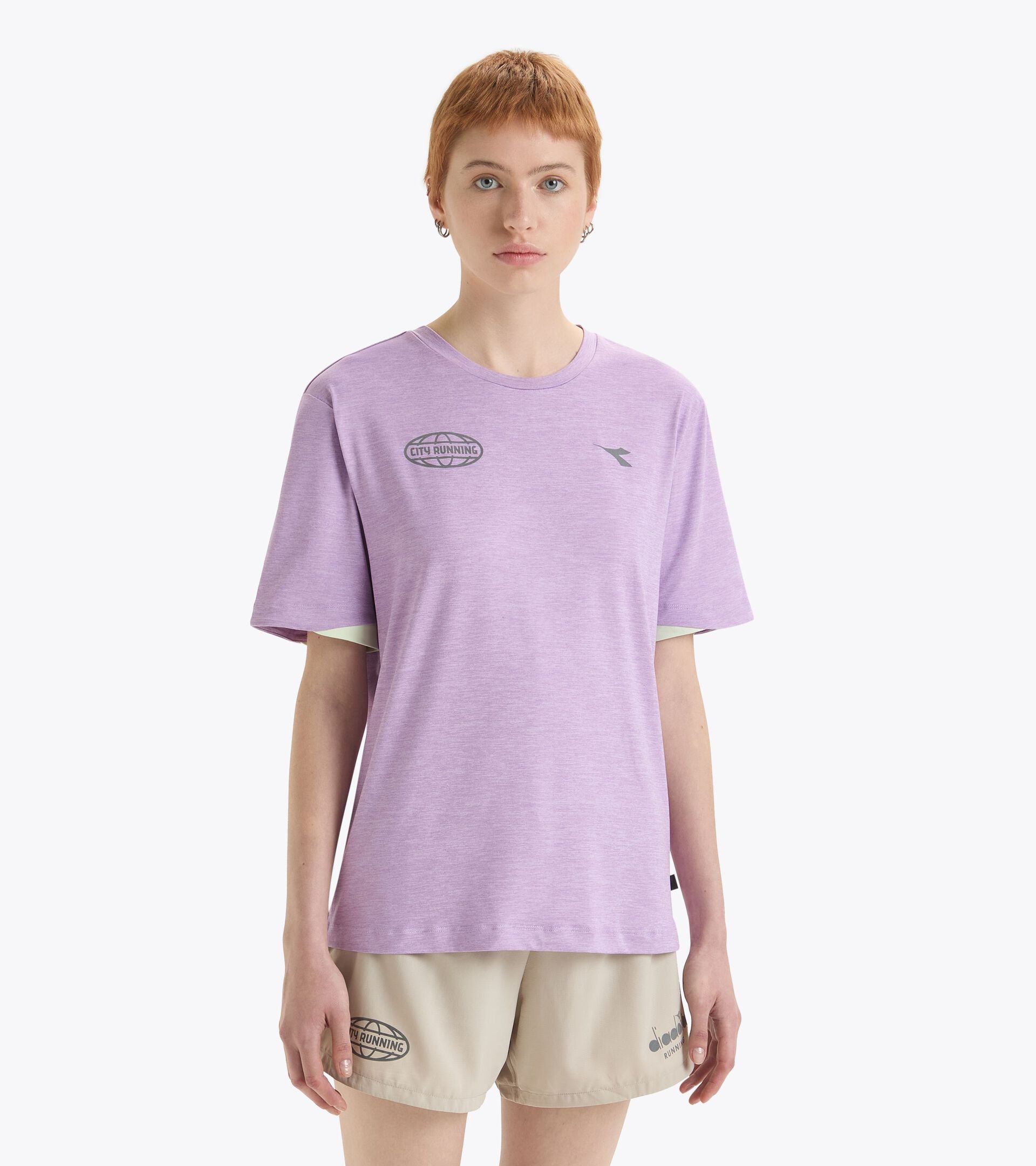 Unisex short sleeve training T-shirt in purple made from soft, stretchy polyester fabric.