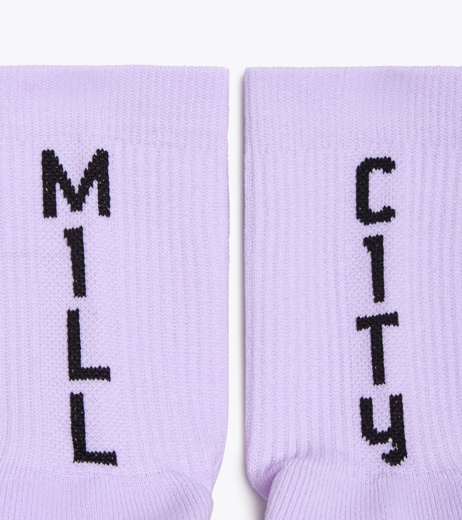 Purple SOCKS MILL CITY running socks with black text, padded toe and heel.