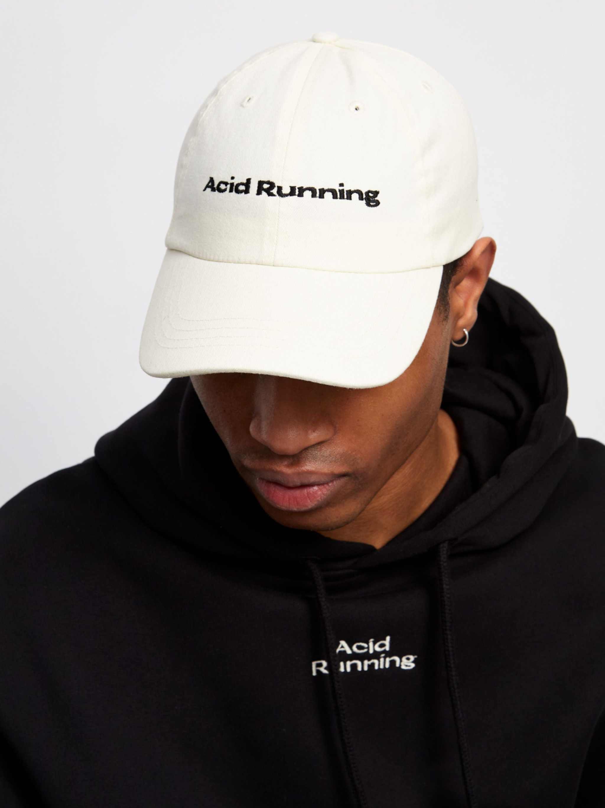 Luxury Pace Cap in bone color, ethically made with expert embroidery in England