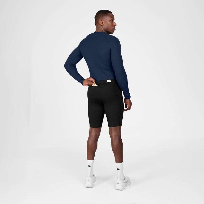 Combat+ Short Tights 9 inches in black made from recycled polyester with multiple pockets for runners