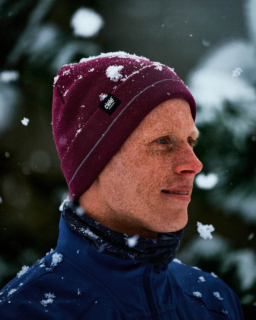 CR3Beanie - Cab in snowy weather, featuring double-layer recycled polyester with reflective stripe.