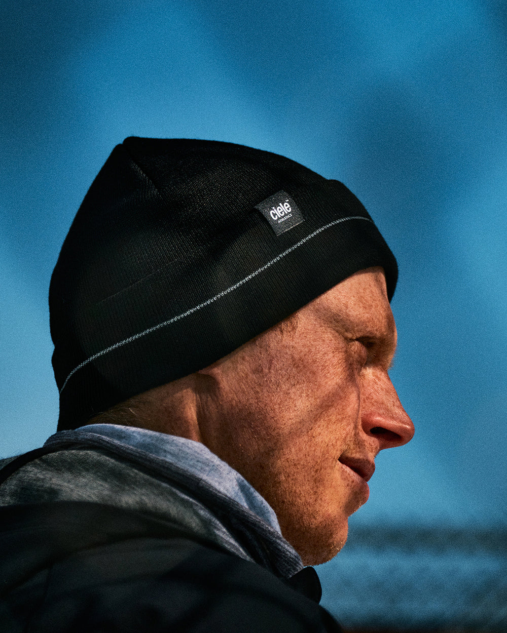 CR3Beanie - Shadowcast featuring double-layer knit with reflective stripe for night runs.