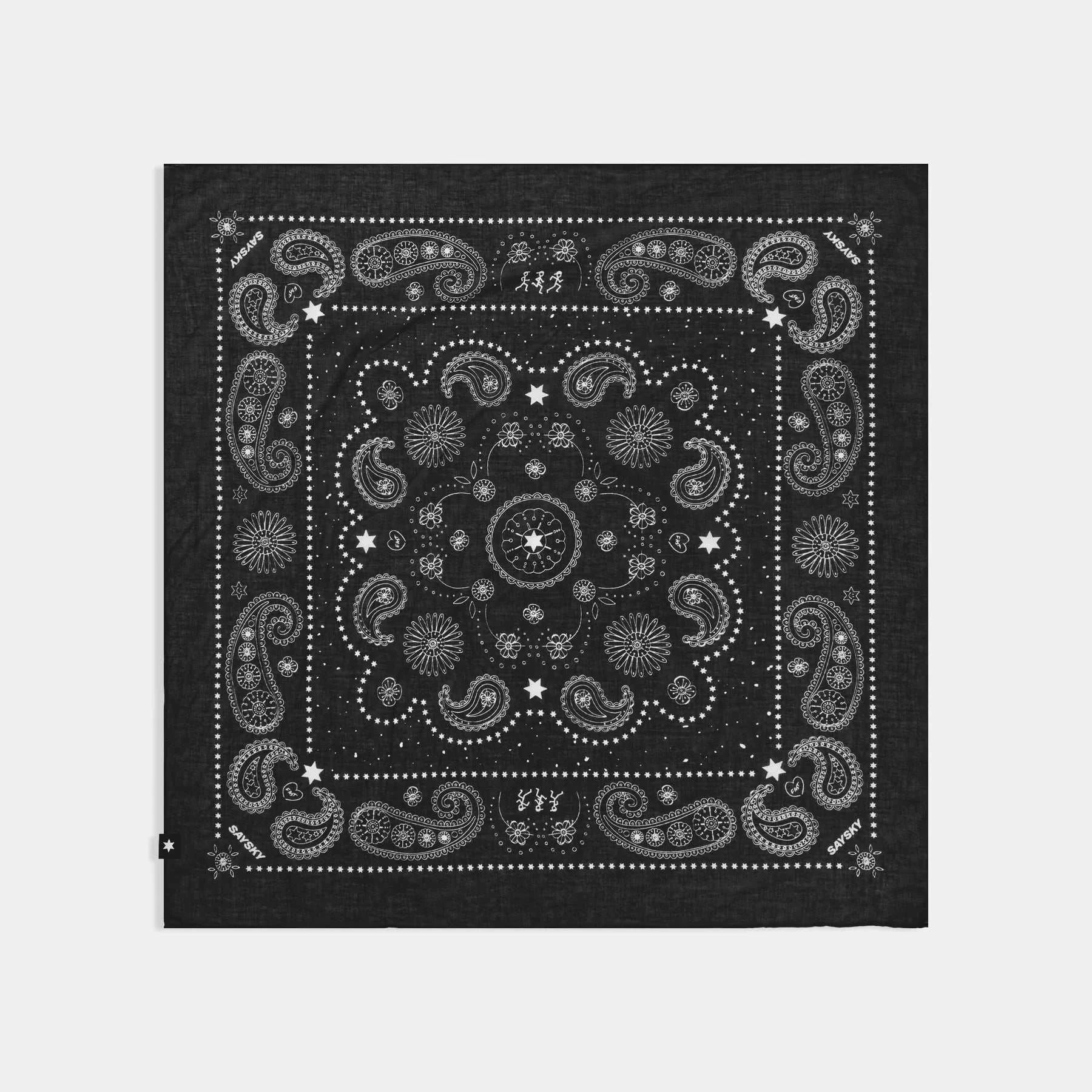Versatile bandana in black cotton featuring a classic white paisley and star pattern with a rolled edge finish.