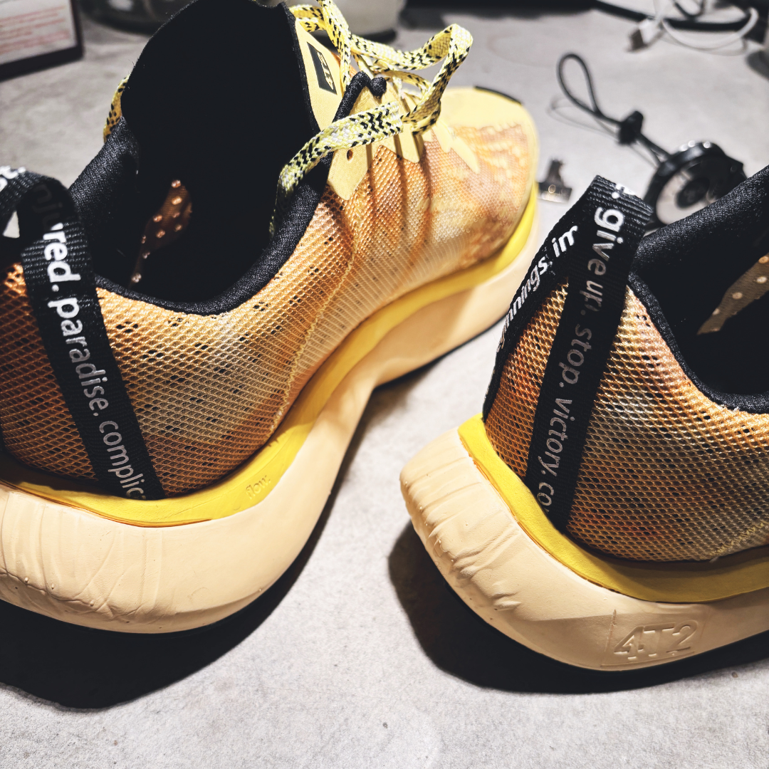 Yellow personality  running shoes with breathable design, featuring a grippy rubber outsole and lightweight, stable construction.