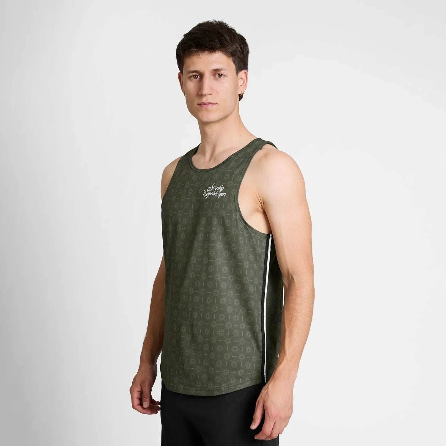 Couture Combat Singlet in dark green with subtle geometric pattern, lightweight breathable fabric, and white side stripes.