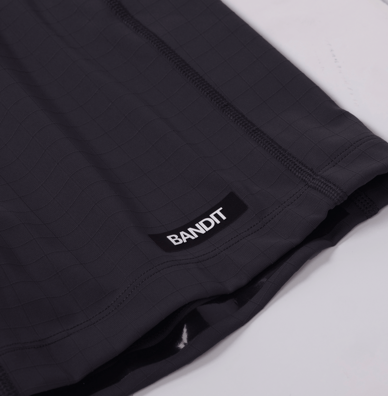 Gridlock™ fabric, gen 7 pocket half tights with silicone branding patch.