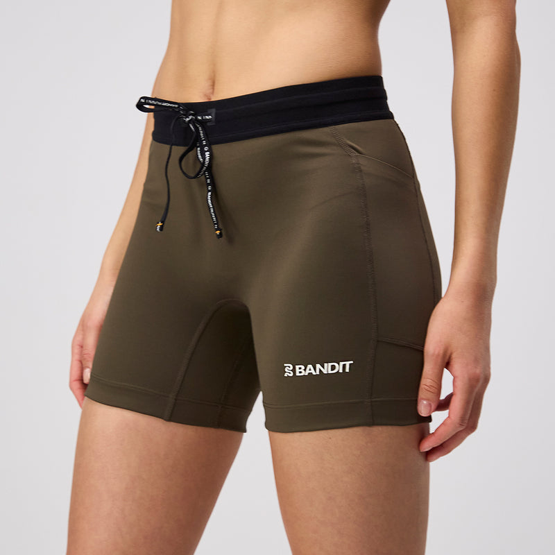 Stamina™ 5" Women's Compression Shorts in Dark Fatigue with pockets and reflective details.