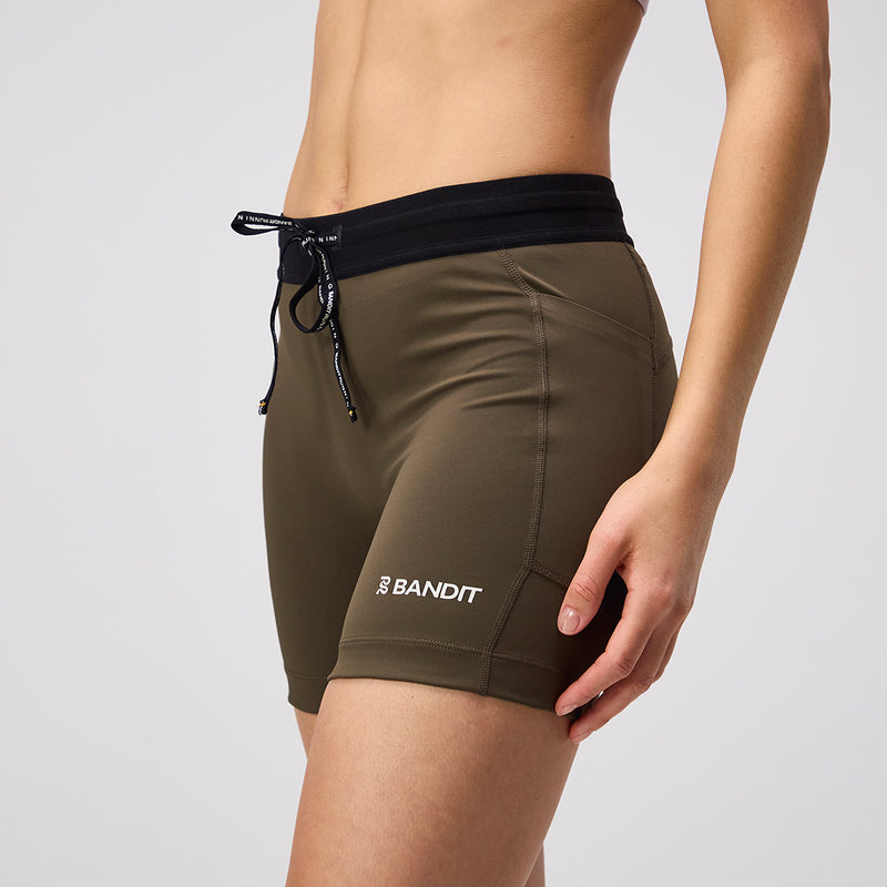 Stamina™ 5" Women's Compression Shorts in Dark Fatigue with pockets and reflective details.