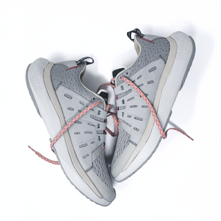 Lightweight grey and black 'sundays.' running shoes with breathable mesh and supportive design.