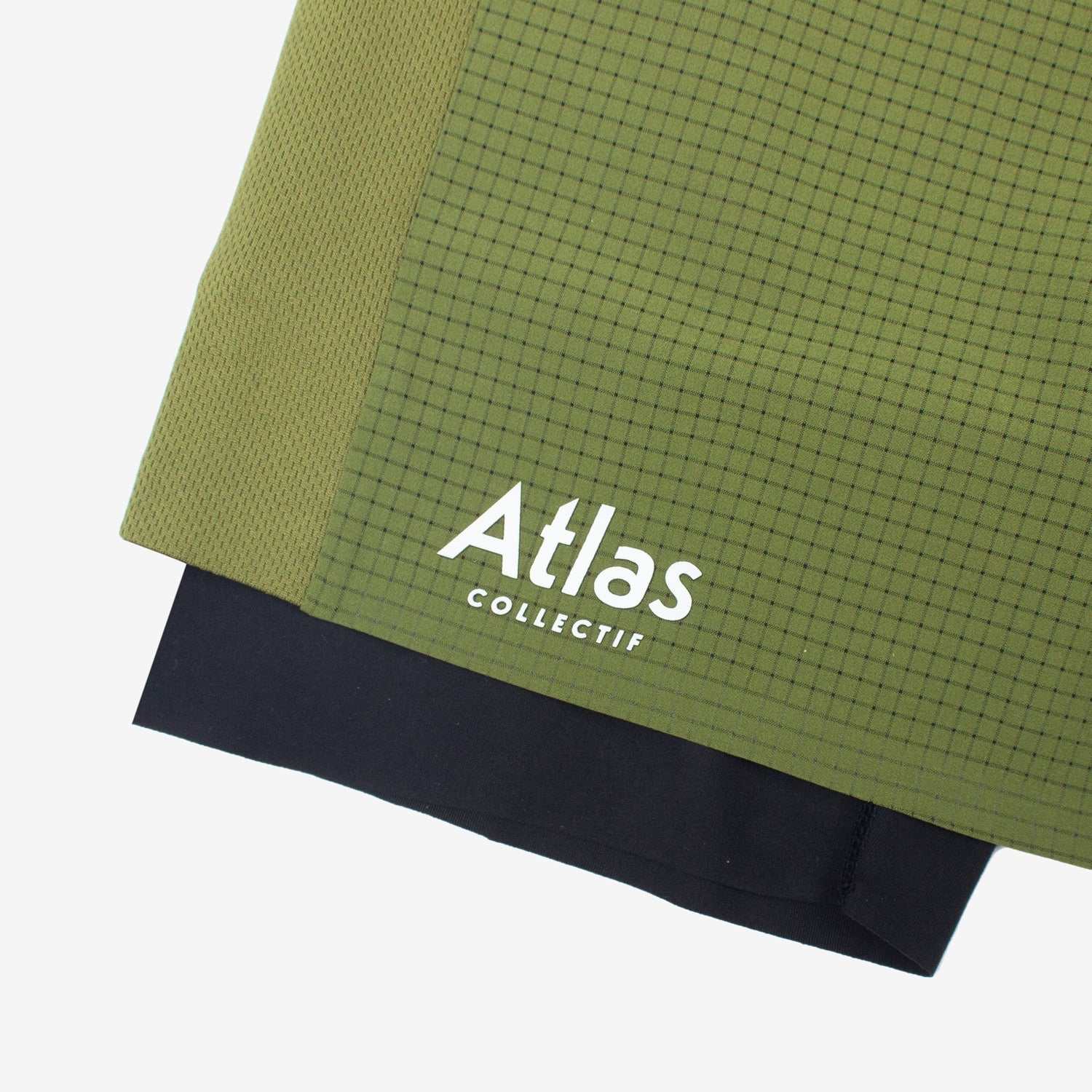 Olive green 2 in 1 running shorts with tight fit and recycled materials.