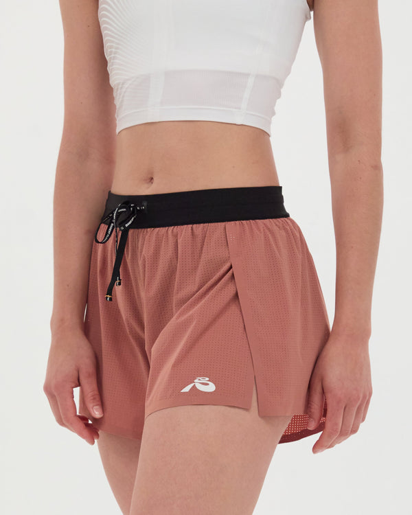 Women's Vento™ 3" Split Short in Baked Clay with stretch performance fabric.
