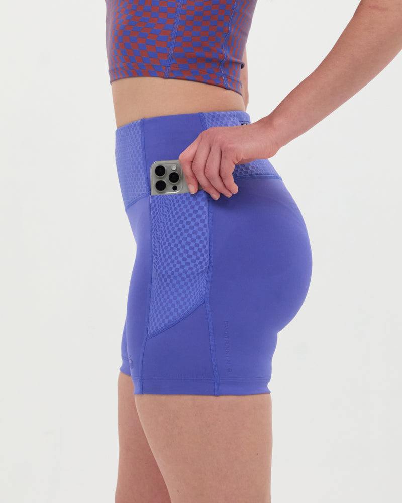 High waist compression shorts in Deep Peri Blue with phone pocket, reflective logos, and anti-chafing design.