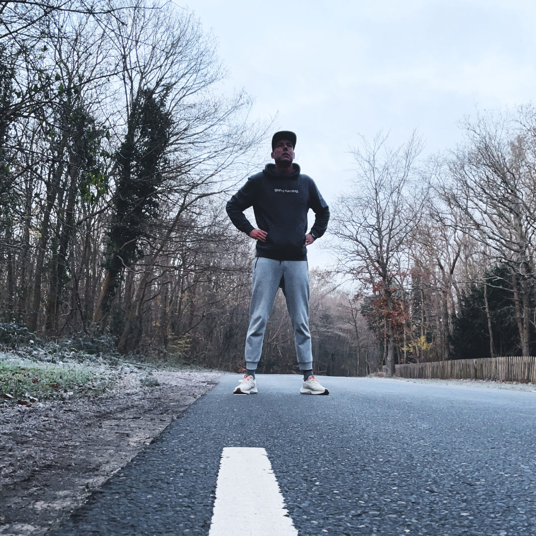 sundays vintage white shoes on a road, casual jogger in outdoor setting