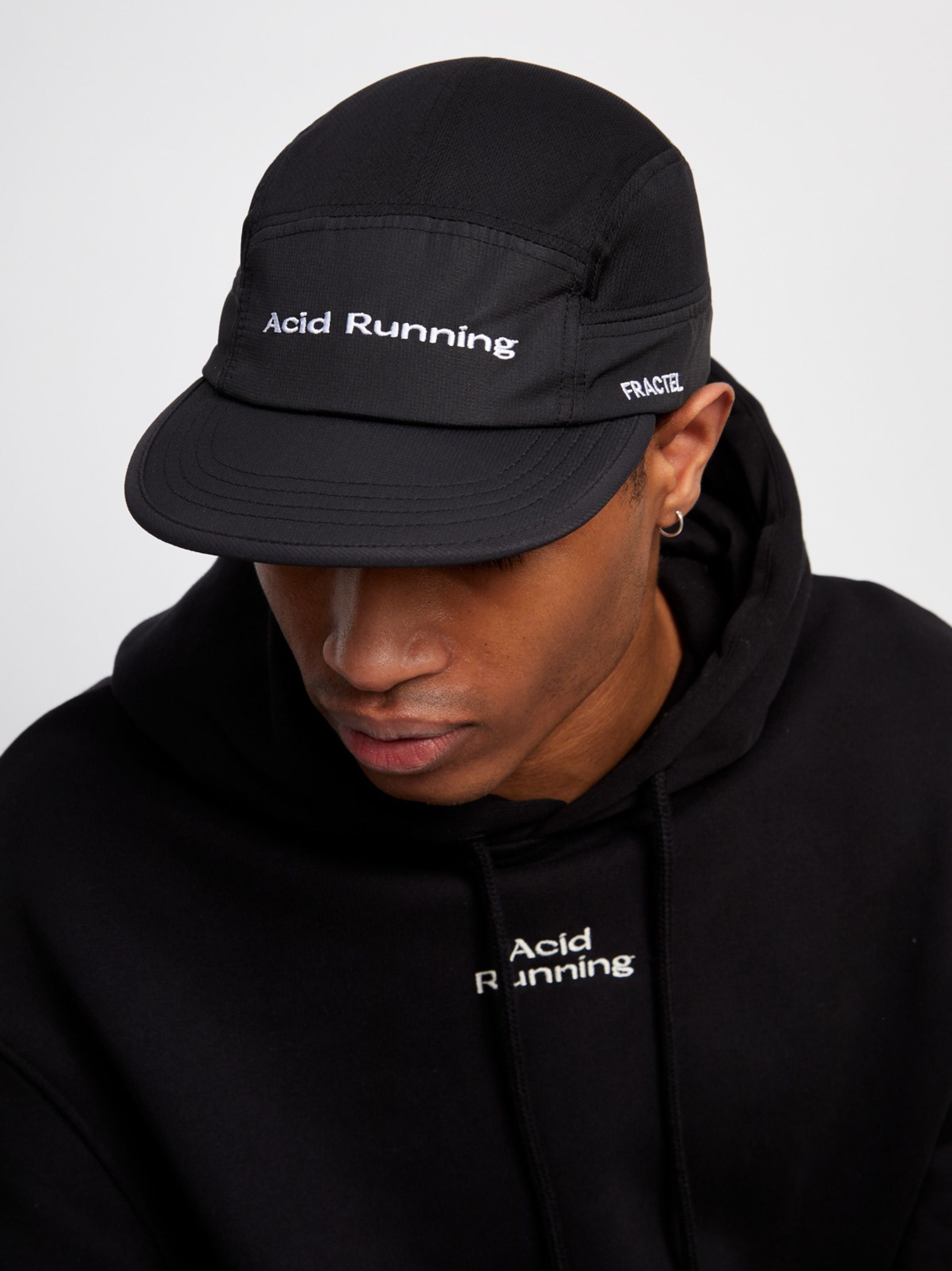 Limited-edition Acid x Fractel black cap with embroidered logos.
