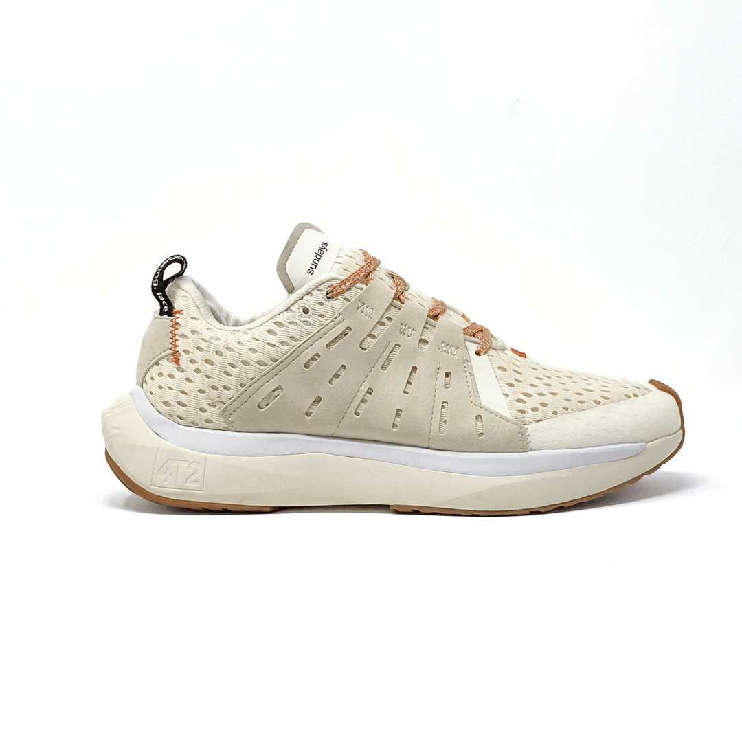 Sundays vintage white running shoe with breathable upper and supportive midsole design.