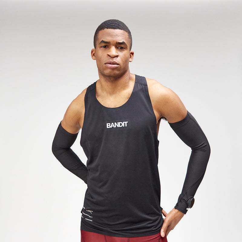Black Drift™ Racing Singlet with narrow straps and racerback, featuring anti-chafing fabric and reflective details.