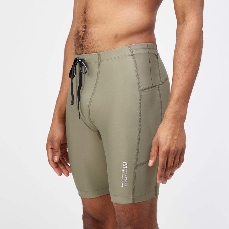 Superbeam™ Next Gen 7 Pocket Half Tights in Fatigue color, featuring optimized fit and multiple pockets.