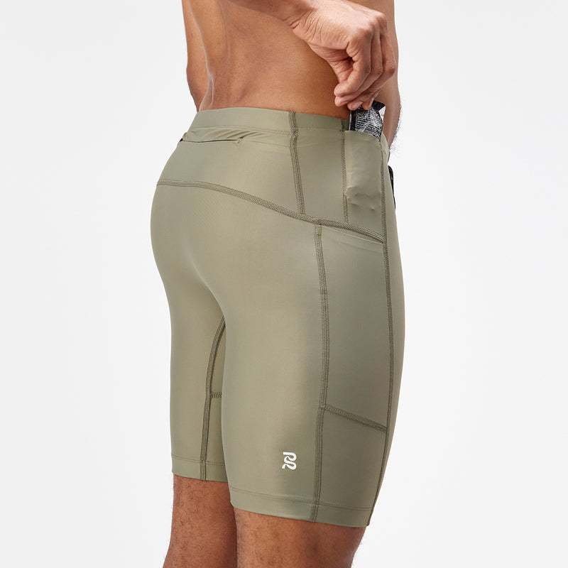 Superbeam™ Next Gen 7 Pocket Half Tights in fatigue, featuring optimized gusset, 7 pockets, and reflective branding.