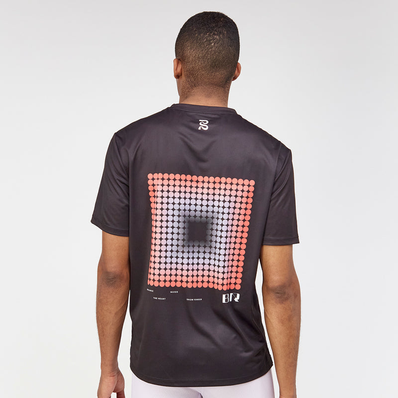 Drift™ Performance Tee in Black with seasonal graphic, showcasing crew neckline and side slit, perfect for activewear.