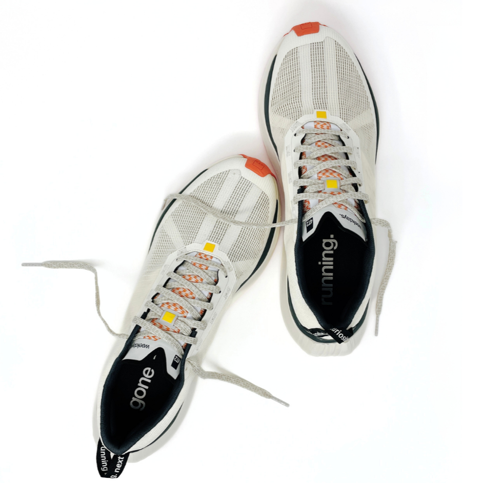 weekdays vintage white running shoes with mesh design and orange accents