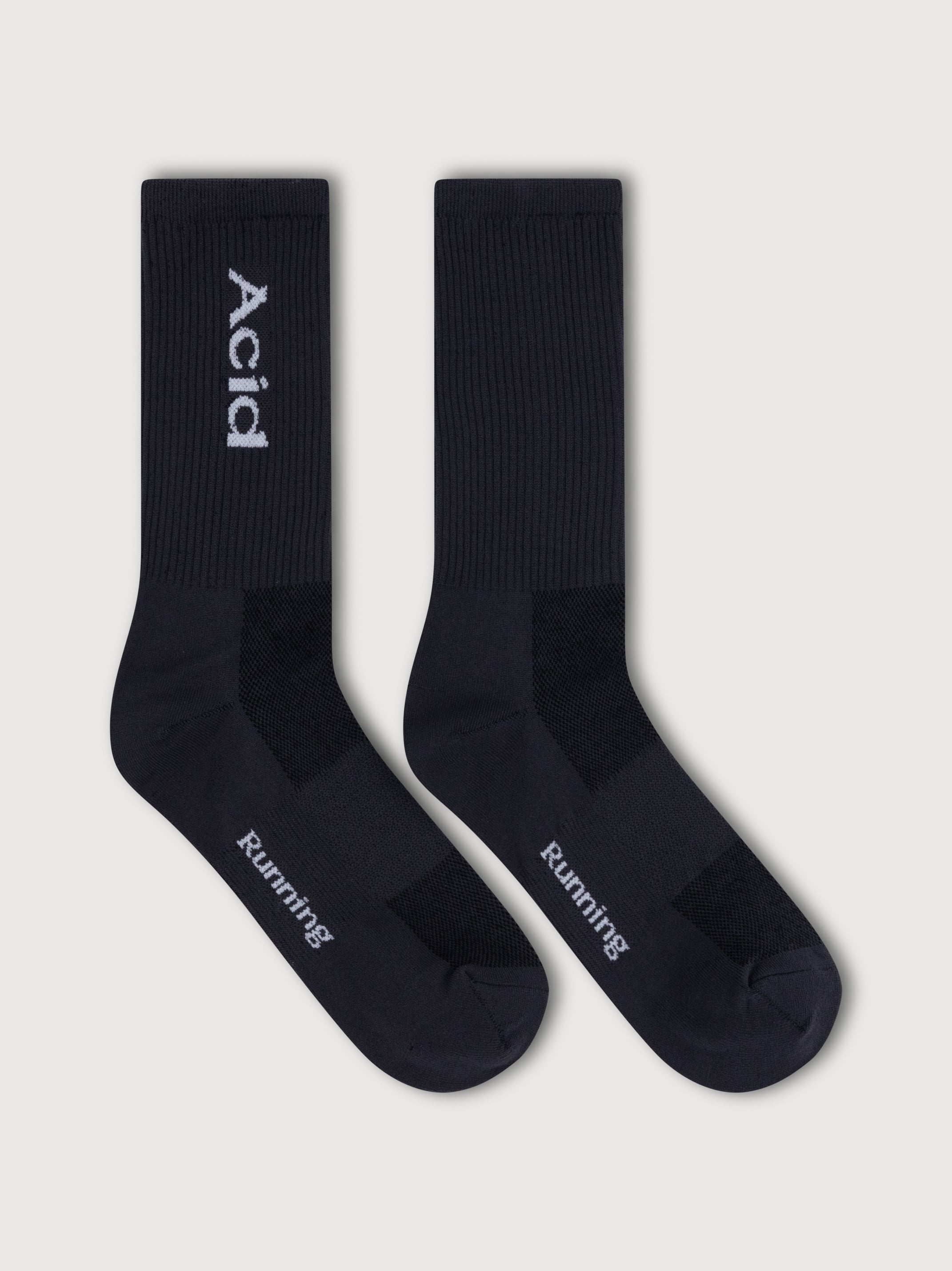 Black logo socks with breathable, ultra-lightweight fabric and ankle-high casual design.