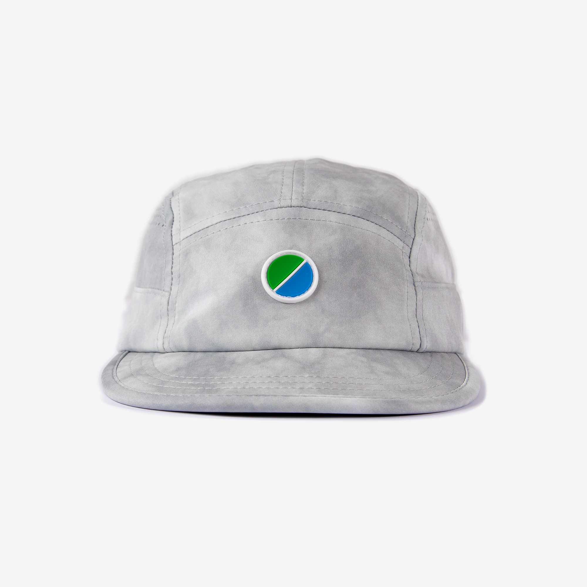 Grey tie-dye V3 Core Cap with adjustable strap and reflective details for lightweight performance and ventilation.