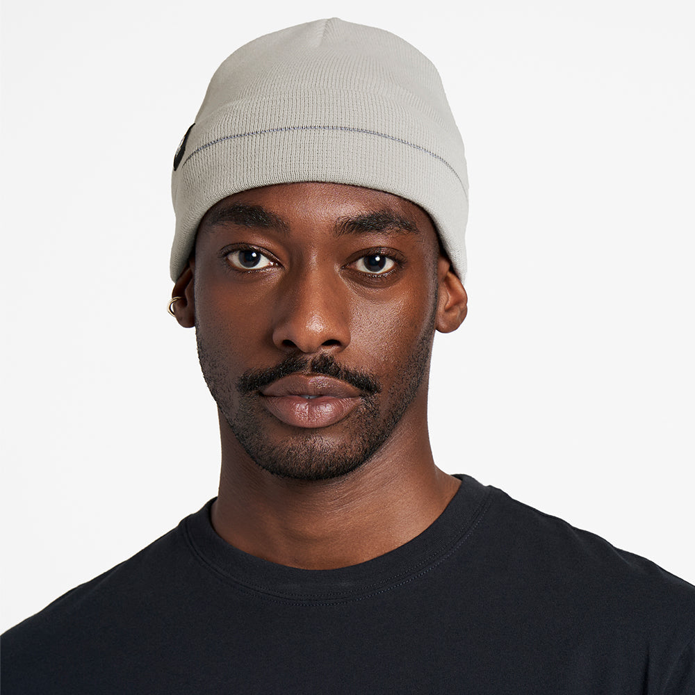 CR3Beanie - Stadium, gray beanie with reflective stripe, 100% recycled polyester.