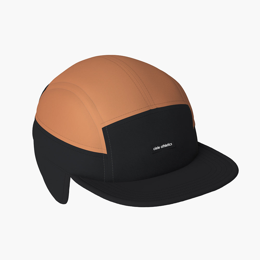FLTCap WND Ultra Iconic Black Canyon hat with foldable ear flaps, reflective detailing, and SOFTflat brim.