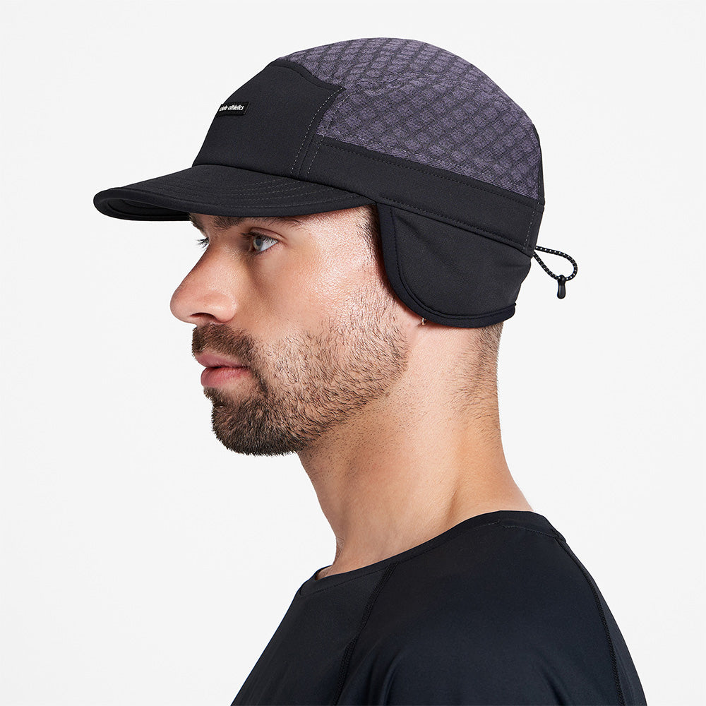 Windproof winter cap with ear and neck coverage, designed in Montreal for cold weather.