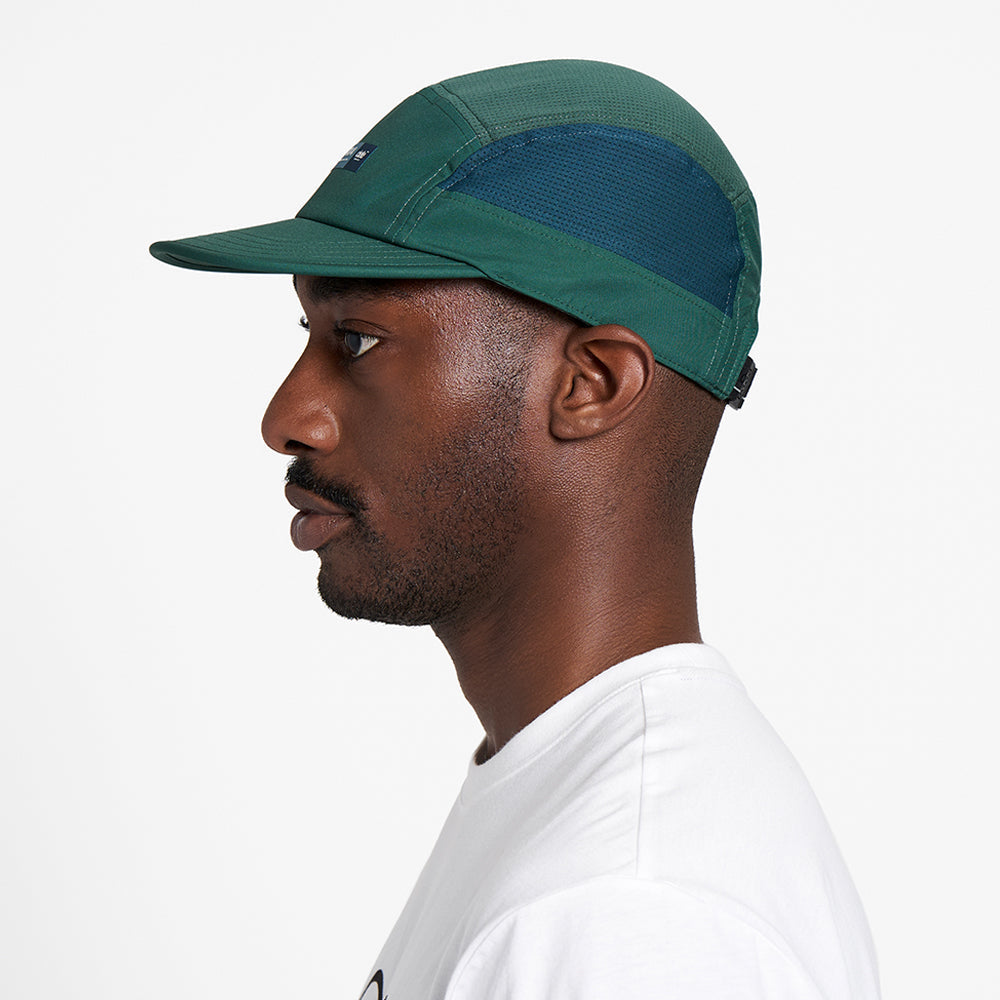 Lightweight GOCap Spruce with COOLmatic fabric, reflective details, and pliable brim.