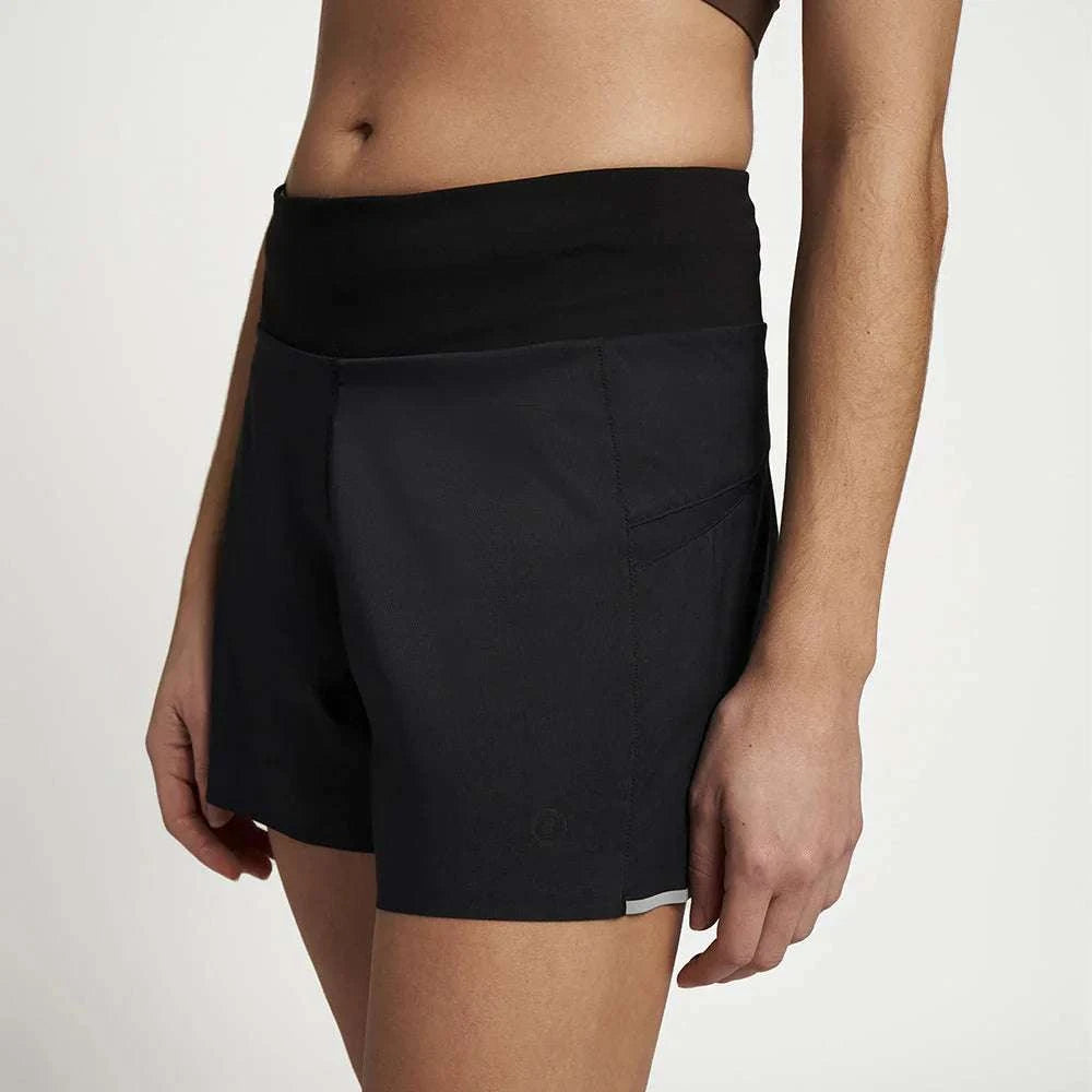 W TRNShort 4" brief in black, high-rise running shorts with reflective, sun protection, wicking fabric, and a COOLmatic|PLUS liner.