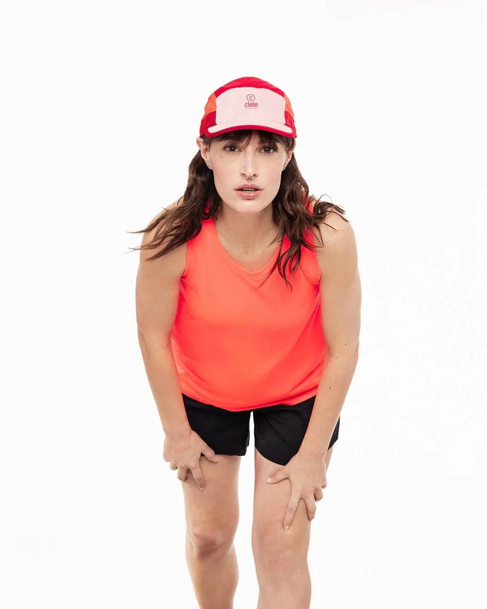 W FSTSinglet in vibrant color with reflective, quick-dry fabric and side vents for optimal cooling.