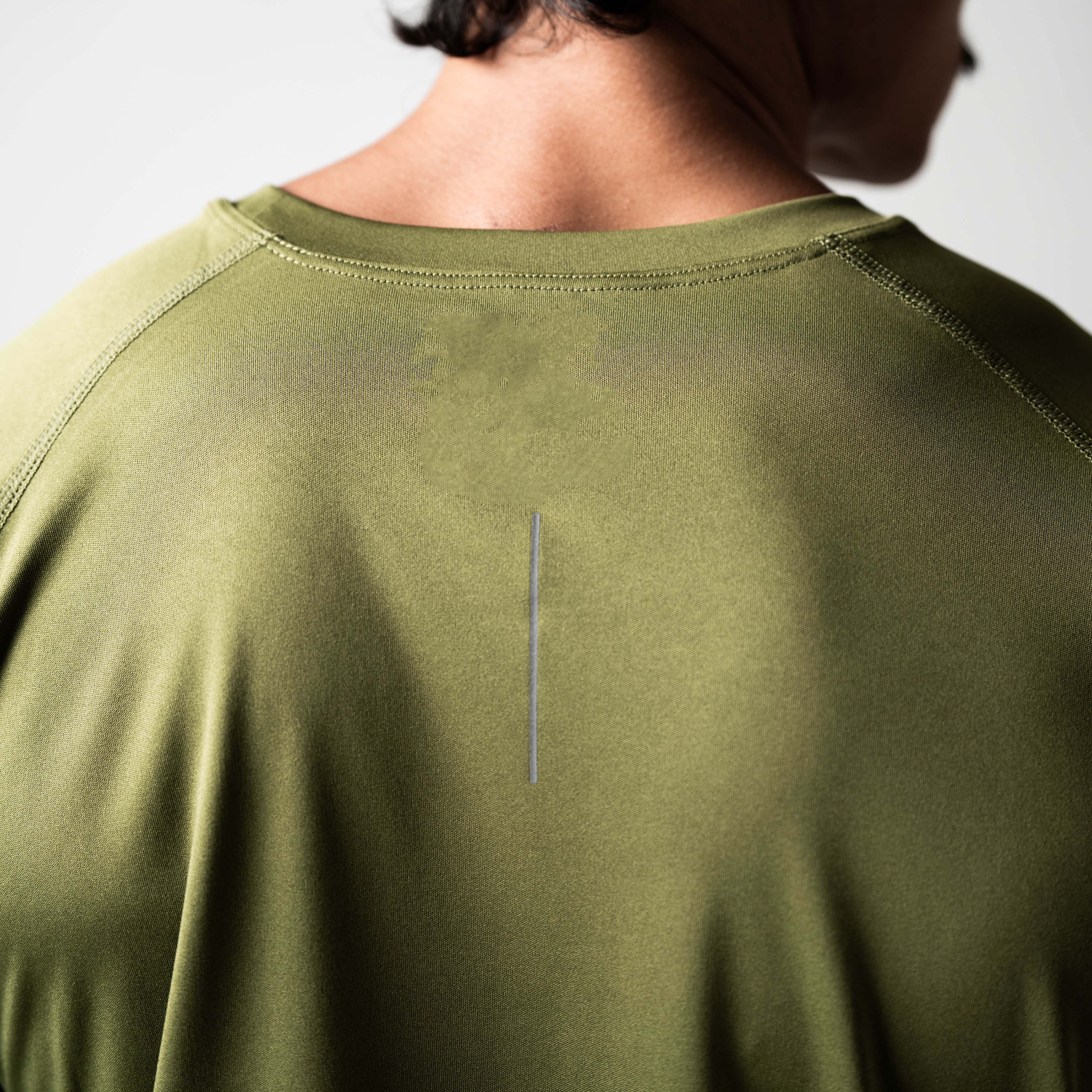Olive green performance running T-shirt with reflective detail and raglan cut, made from recycled polyester.