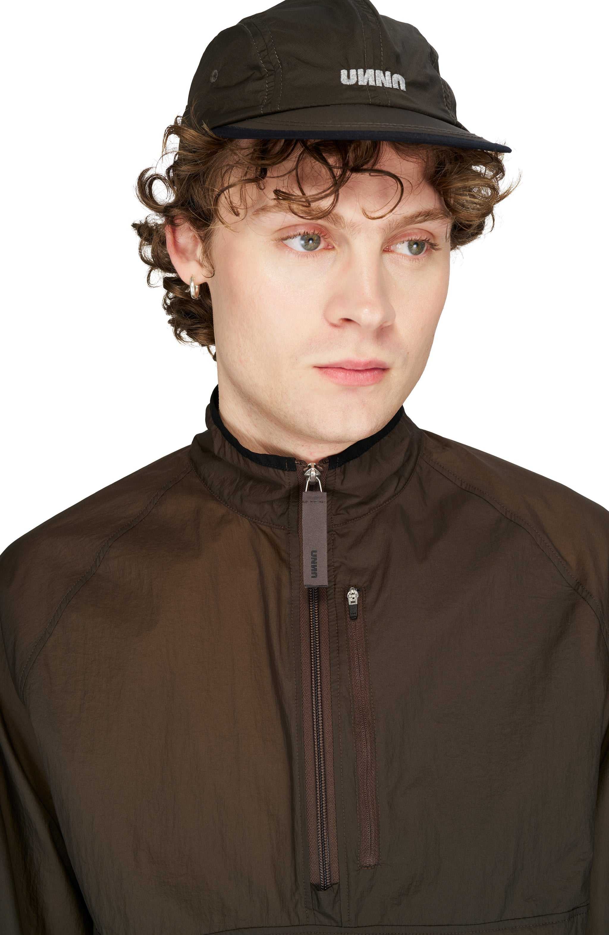 Lightweight water repellent running jacket in Wren Brown made from recycled polyester.