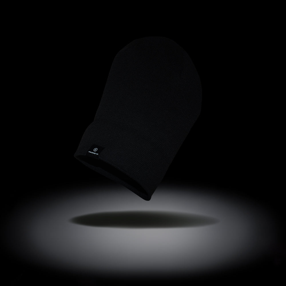 CR3Beanie - Shadowcast in black with reflective stripe, made from 100% recycled polyester.