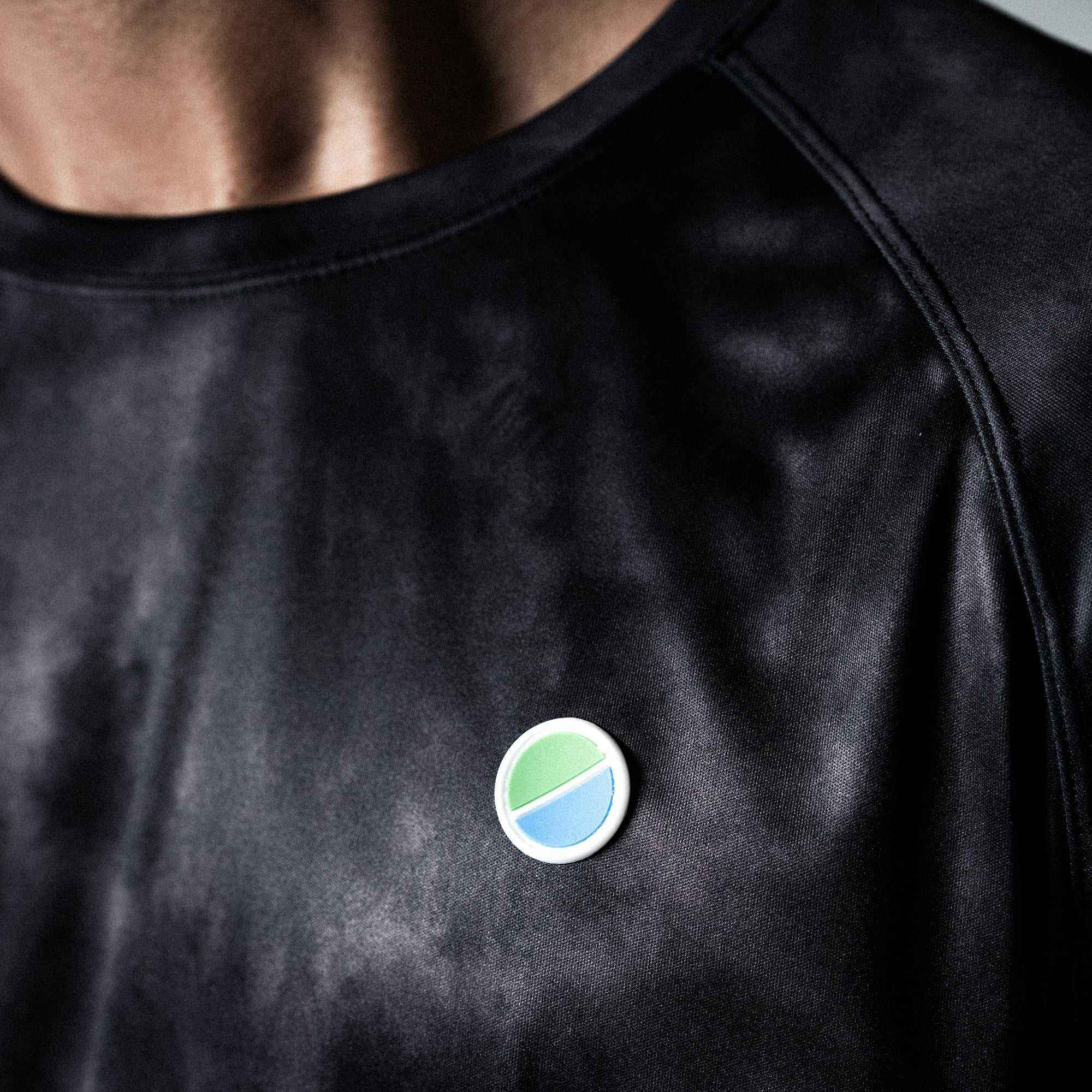 Black tie-dye FML x MNS T-Shirt with mesh panels and hidden pocket designed for runners