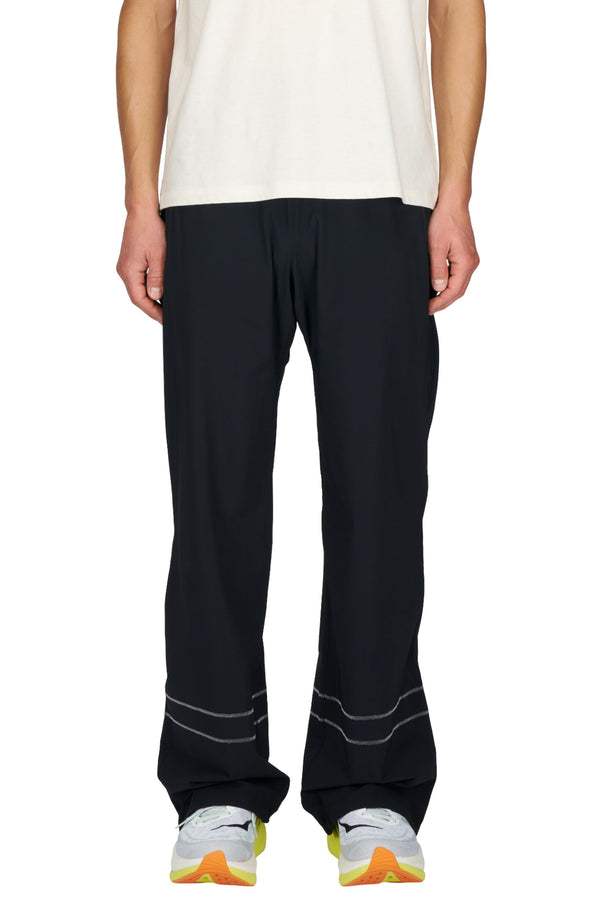 Unisex wide running pants in Java Brown with reflective seams and phone pocket.