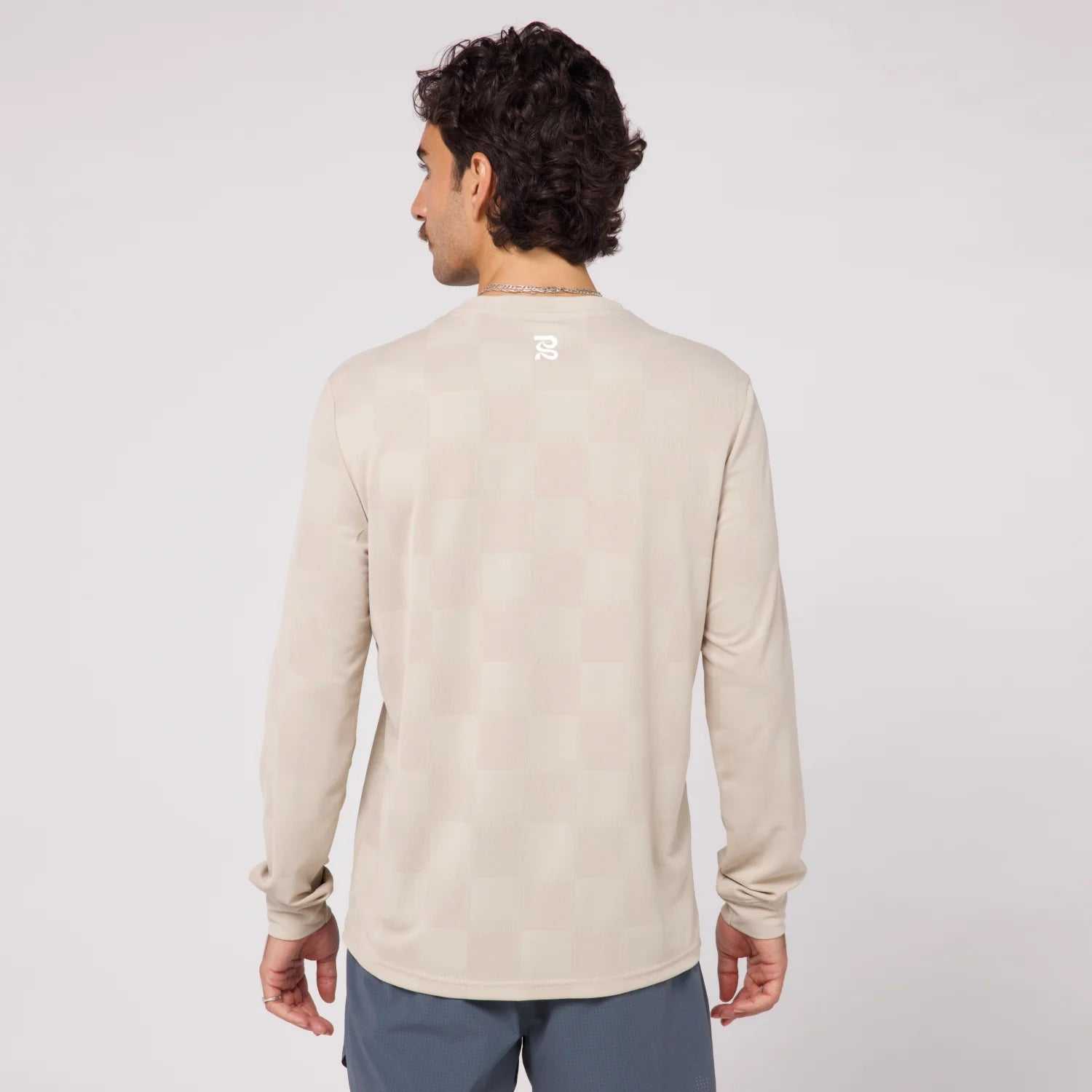 Unisex stone long sleeve shirt with graphic hits, crafted from ultra-lightweight Cheque Jacquard™ fabric.