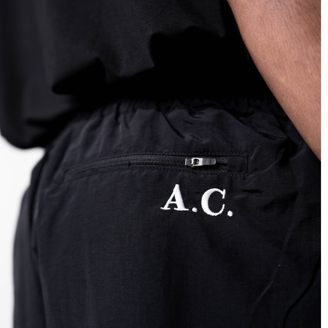 LPU 5" Running Shorts - Black with back pocket zipper and initials embroidered.