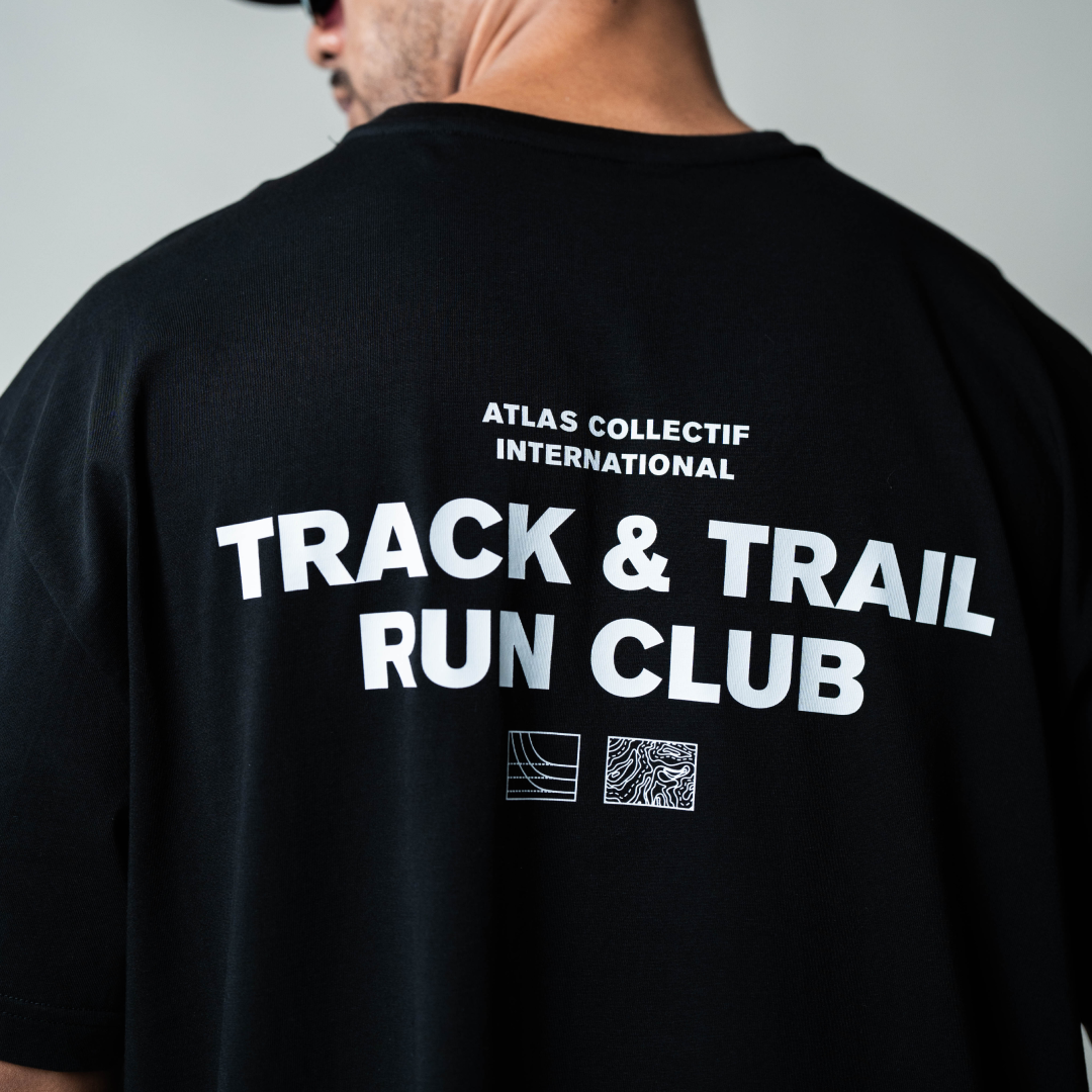 Track & Trail Organic Cotton Tee in black with printed back design.