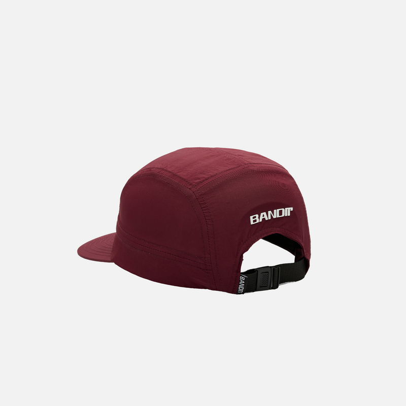 Nylon "NY Runner" run hat in port color with adjustable back closure and high-density branding.