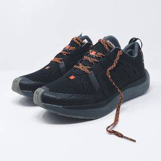 Black running shoes with orange laces, featuring breathable mesh upper and dual density midsole for comfort.