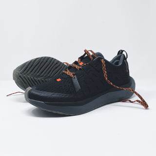 Black running shoes designed for comfort and long-distance runs, featuring smooth road outsole and breathable upper; perfect for Sundays.