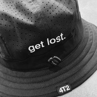 Technical adjustable bucket hat with "get lost" message and ventilated panels.