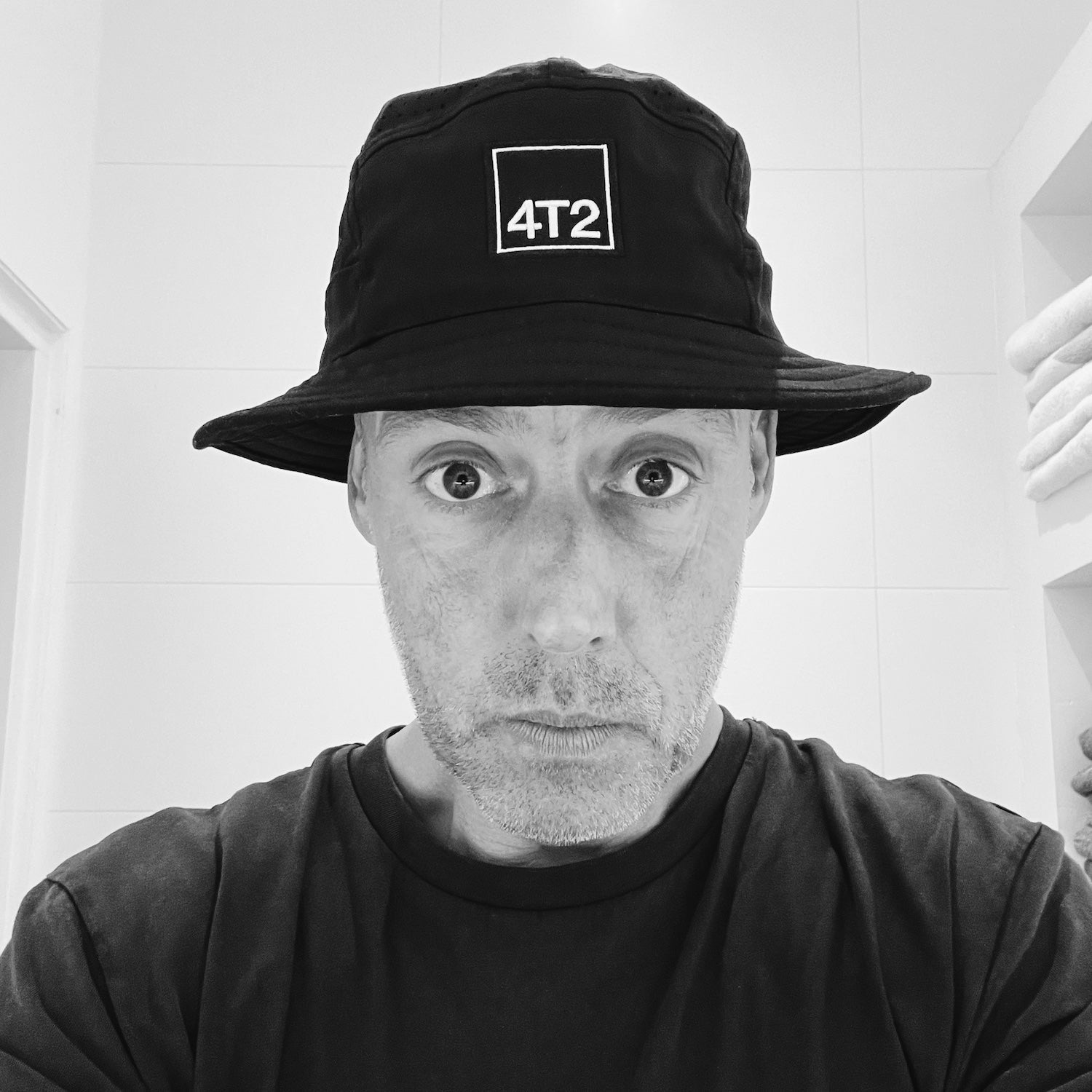 technical adjustable bucket hat with elastic strap and ventilated panels