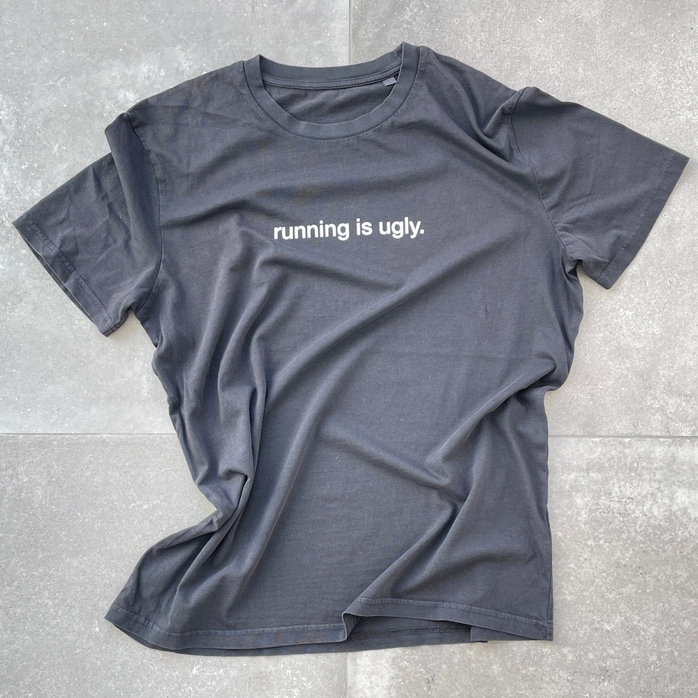 Vintage black tee with "running is ugly" text, 100% organic cotton, relaxed unisex fit.