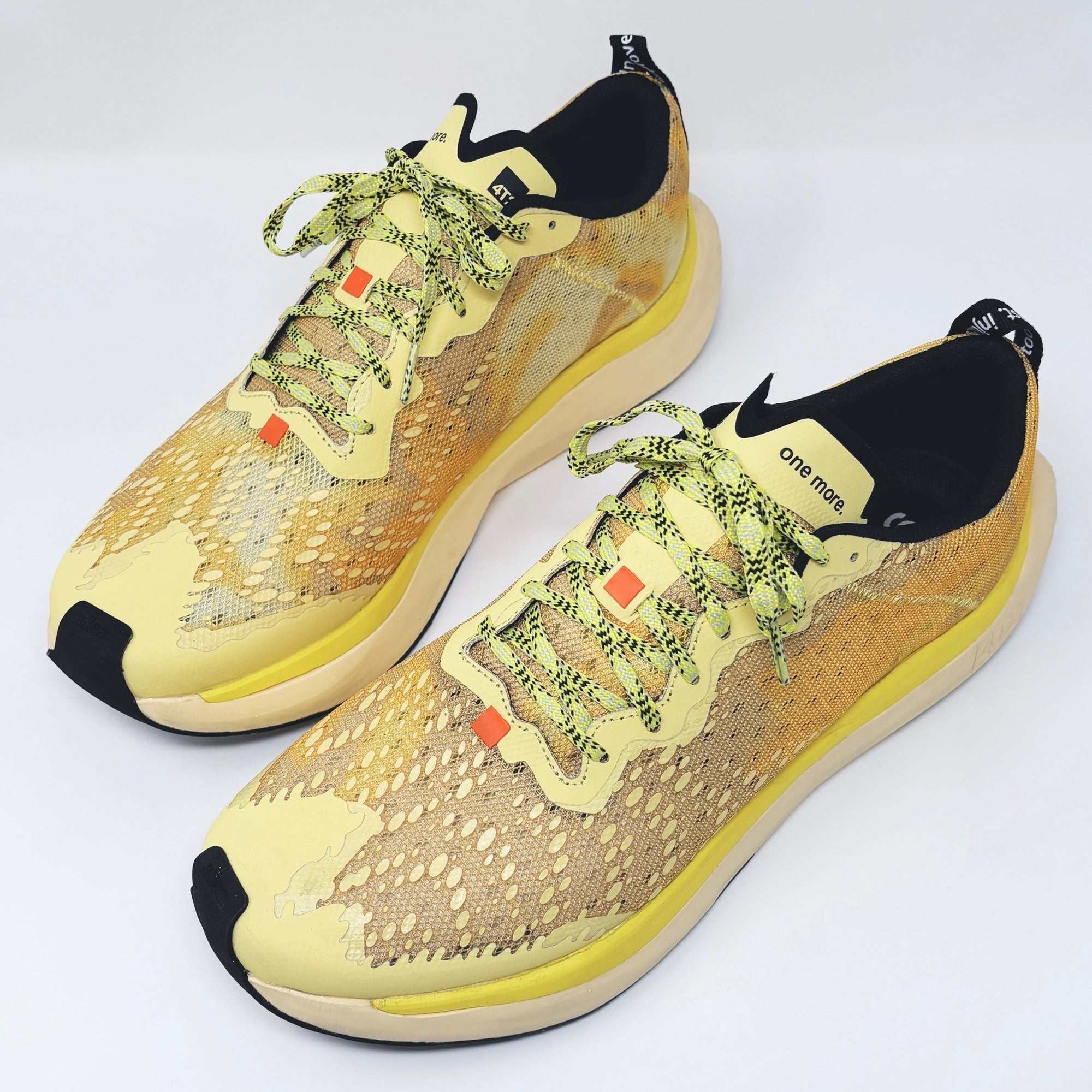 Yellow personality running shoes with breathable upper, grippy outsole, and a distinctive design.